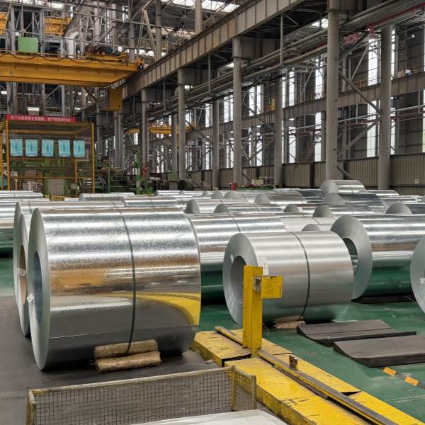 Slit customized width galvanized steel coil rolls lined up in processing workshop