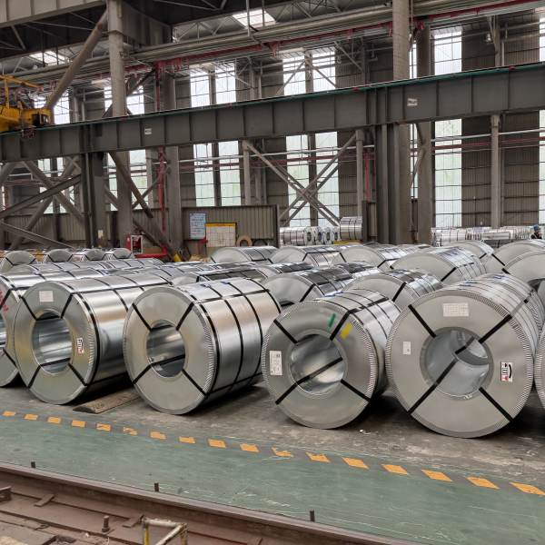 Modern metal slitting lines running at the plant of galvanized steel coil suppliers.
