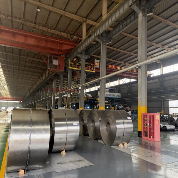 Sea-worthy export packing for SPCC cold rolled steel coils with steel strapping.