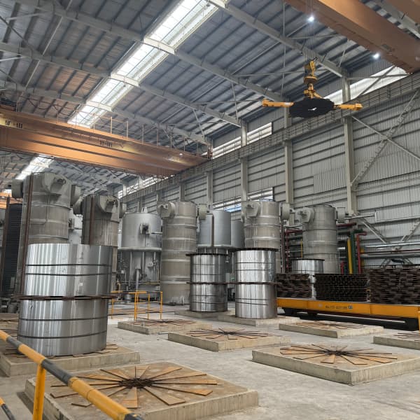 Laboratory hardness testing machine inspecting steel cold rolled coil.